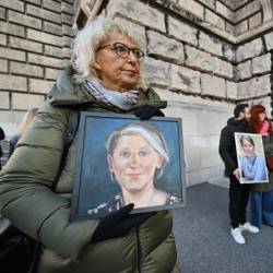 Protestniki so poleg transparentov imeli s seboj slike pokojnice (FOTODAMJ@N)