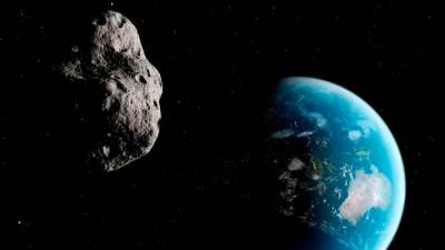 Umetniški prikaz nocojšnjega preleta asteroida (ANSA)