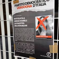 Plakat pred vhodom v šolo Don Milani