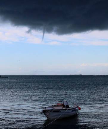 Dopoldne vrtinec, zvečer toča