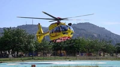 Helikopter reševalne službe pri Enemonzu (ANSA)