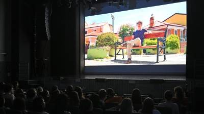 Predvajanje dokumentarnega filma Osmica na Slofestu (FOTODAMJ@N)