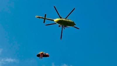 Poškodovano pohodnico so z vitlom dvignili na helikopter (CNSAS FVG)