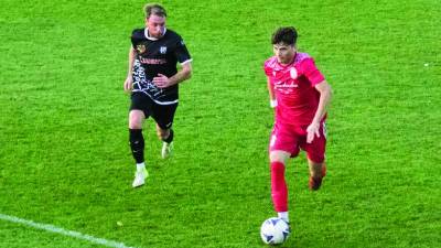 Juventin nogometaš Daniel Liut v akciji (BONAVENTURA)