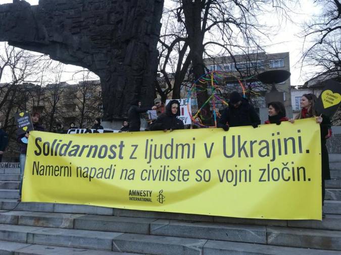 Napis Amnesty International (S.T.)