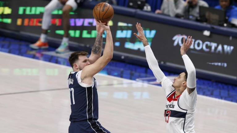 Dončićev trojni dvojček za novo zmago Dallasa