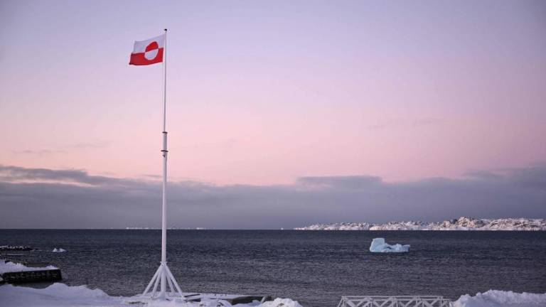 Premierja Danske in Grenlandije za odločen odziv v primeru eskalacije groženj ZDA