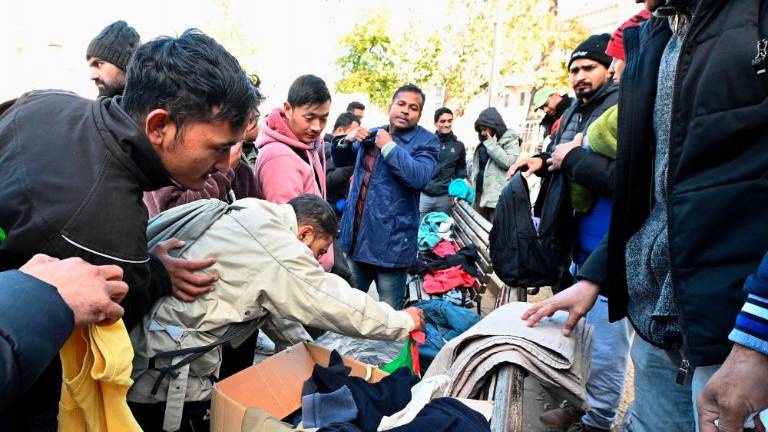 Humanitarci in občani za migrante