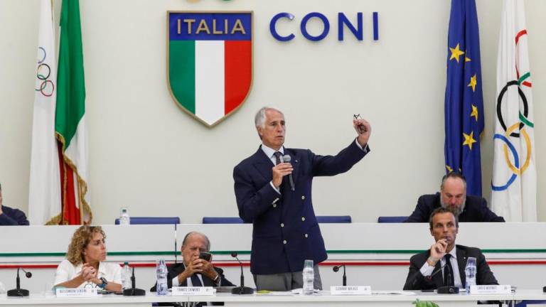 Italija v Tokio brez zastave in himne?