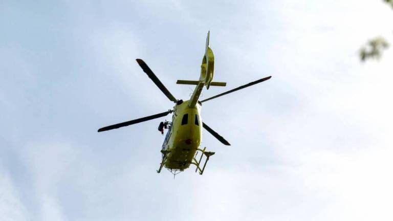 Poškodovani v prometni nesreči s helikopterjem v bolnišnico