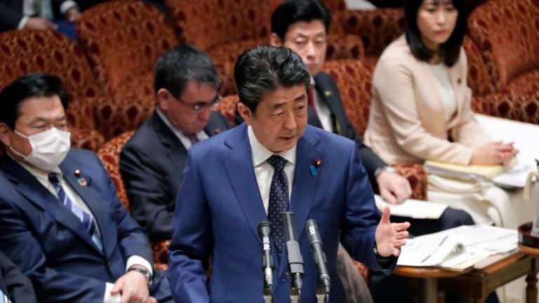 O preložitvi olimpijskih iger tudi japonski premier Shinzo Abe
