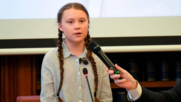 Podnebni štrajk in selfij s črno luknjo