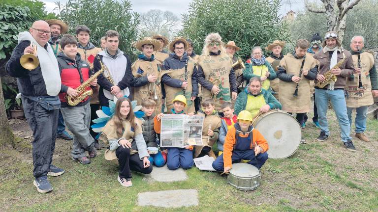 Nabrežinsko godbo tudi na pustnem koledovanju zvesto spremlja Primorski dnevnik. <i>(Nadja Doljak)</i>