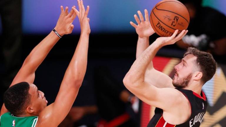 Miami Heat še tretjič ugnal Boston ob 22 točkah Gorana Dragića