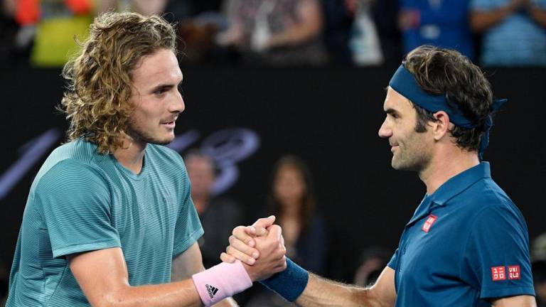 20-letni Cicipas izločil Federerja