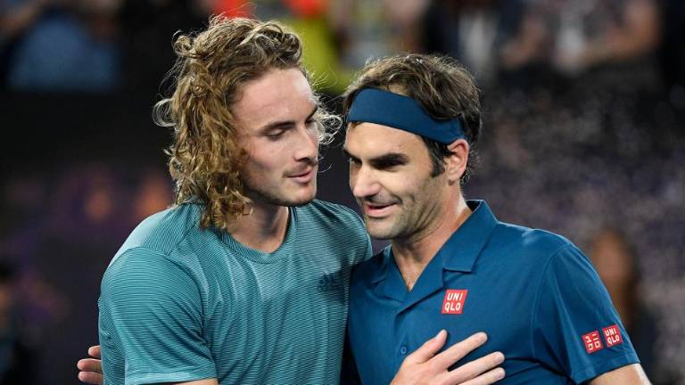 20-letni Cicipas izločil Federerja