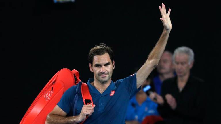 20-letni Cicipas izločil Federerja