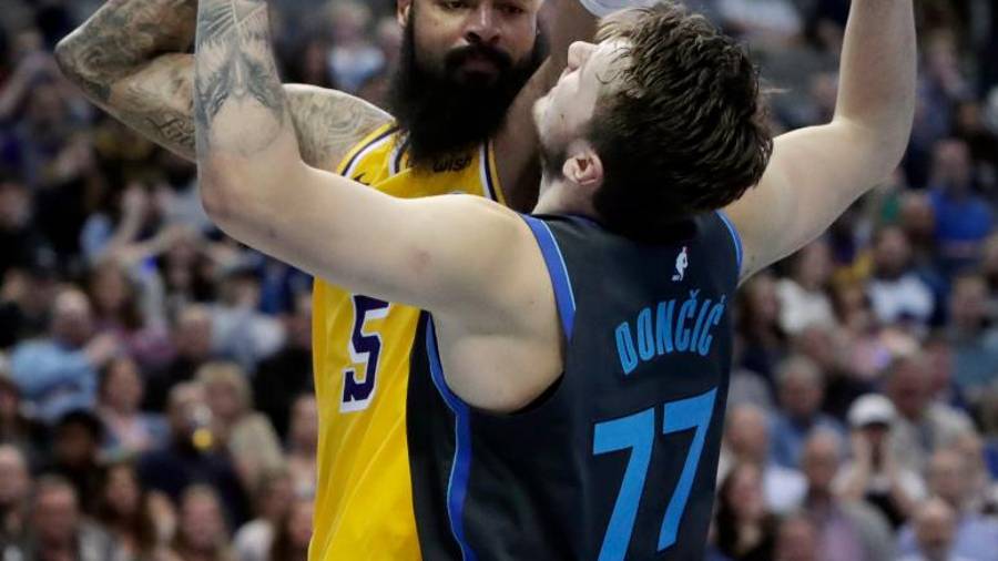 Luka Dončić ima strešici v Dallasu, imel ju je tudi v Madridu (AP)